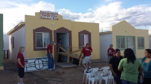 the people of Juarez make the journey to a small stucco house for worship